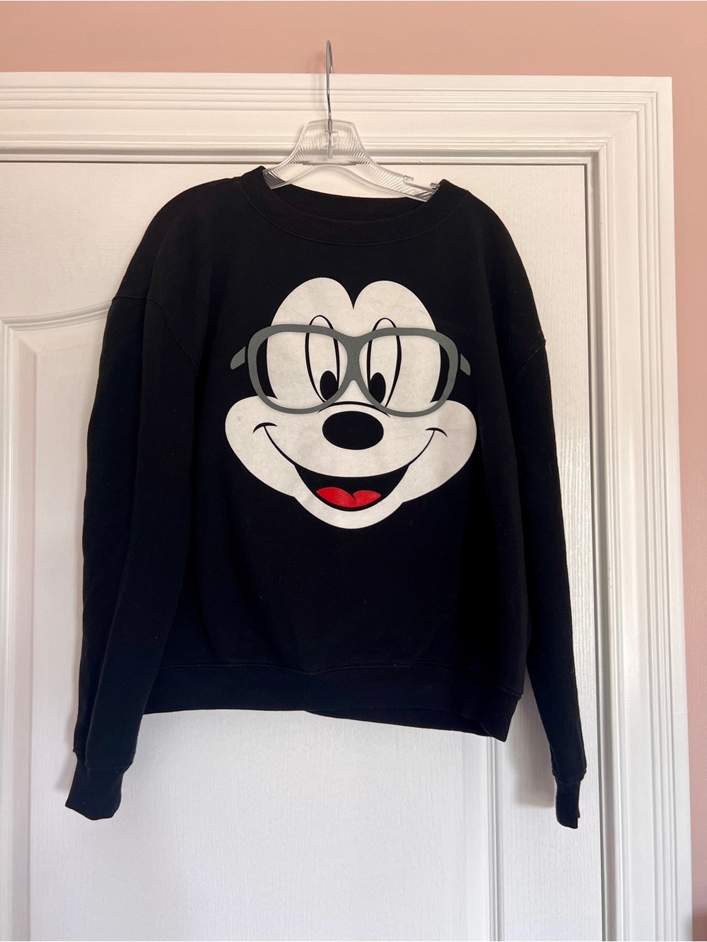 Disney Black Crewneck Sweatshirt with White Cartoon Face and Red Accent